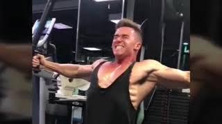 Bodybuilder Alexander Karpov flexing muscles