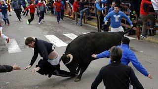Top 10 Funny - Spain Bull Running On Street beating people 