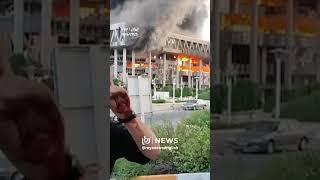 Smoke rises outside Iranian TV building after “Israeli” missile hit