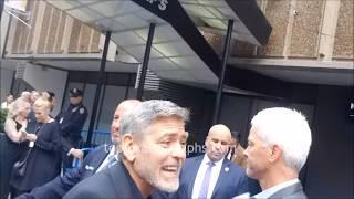 George Clooney signs autographs for TopPix