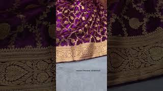  Elegant Banarasi satin silk saree in burgundy, featuring an opulent pallu. 