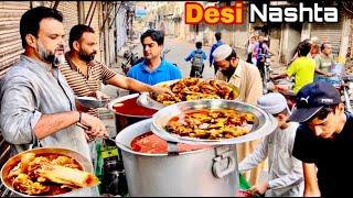 100/- Rs-EXPLORING PAKISTANI PUNJABI DESI NASHTA | BEST STREET FOOD IN LAHORE | BONG PAYE | CHANAY