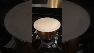 Milk boiling in new vessel during house warming.