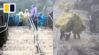 Visitors evacuated as heavy rain batters Chinese mountain