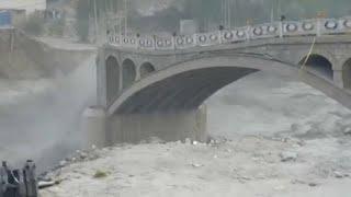 Pakistan bridge swept away in flash flooding