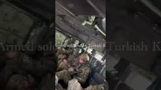 Ukrainian Armed soldiers in a Turkish Kirri MRAP