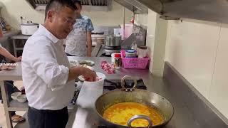 CM of Sikkim PS Golay was seen enjoying cooking in kitchen with others. #cm #sikkim #news