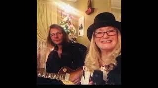 Allison Prior singing original “Bell Island” with hubby  Bernie Scott on guitar.