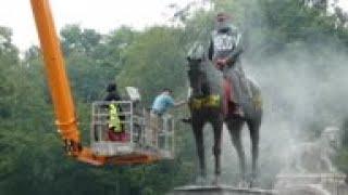 Vandalised King Leopold statue cleaned in Belgium