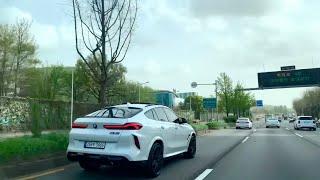 고속도로를 달리는 고성능 버전의 625마력 BMW X6 M