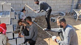 Mustafa took care of his sick daughters and built a room for the goats.