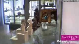 Museum statue starts turning in display case