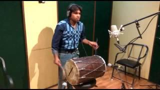 Rahul Bhagania playing dhol in studio