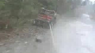 Old Truck Gets Pulled Through Forest