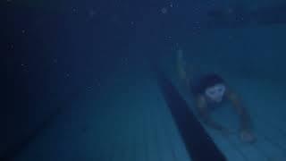 girl underwater and diving in bottom with one breath