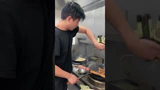 Dual wok style cooking technique