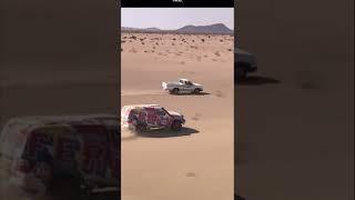 #ksa #dakar #race & #saudi Camel boy competes with a rally professional 