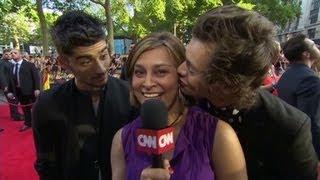 One Direction try to distract CNN's Zain