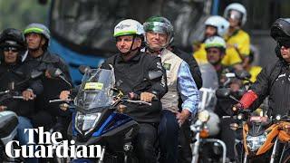 Brazil's Jair Bolsonaro leads motorcade rally in Rio amid coronavirus surge