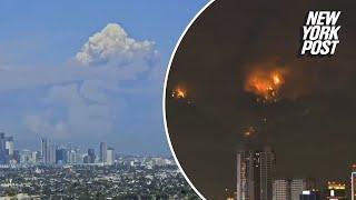 Time-lapse shows bridge fire growing over 24 hours near Los Angeles, CA