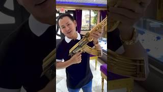 #JohnnyDang Buys 2 Gold Guns! #Gold #Gun #OneStopShop #Viral