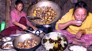 Young girls are cooking and eating pork meat curry in rural Nepal || Local pork curry cooking