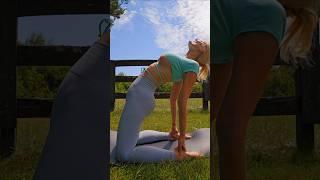 yoga backbend in the warm summer sun