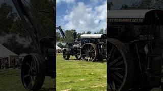 Steam traction engine slipping in the mud with heavy haulage!