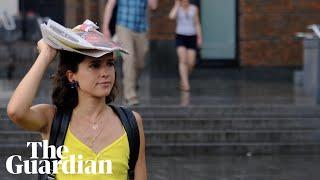 'Uh, so ... it's raining': adverse weather brings end to heatwave