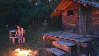 The girl spends the night in the log cabin. Solo sleepover.