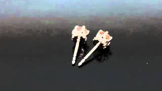 J.C.'s Platinum Peachy Pink Moissanite and Diamond Earrings