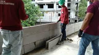 CONSTRUCTION MADE OF PRECAST WALL FORMBLOCKS used in highrise bldg.