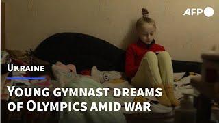 Olympic dreams of young Ukrainian gymnast threatened by war | AFP