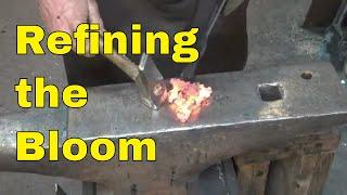 Refining the iron bloom into usable wrought iron