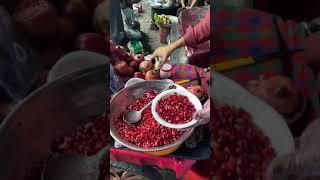 Young Man Selling Pomegranate in Food Street of Sadar Peshwar