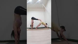 Partner yoga_down dog_HandStand