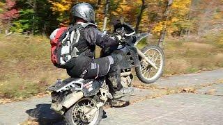 Tim bossing mad wheelies on his KLR650