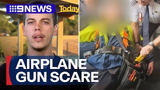 Man recounts moment man allegedly boards plane with gun | 9 News Australia