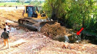 Connect Corner 100% by Heavy Equipment Bulldozer pushing soil and Heavy Dump truck unloading soil.