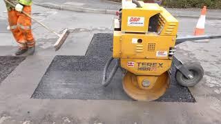 Vá sửa đường bằng bê tông nhựa nóng ở USA