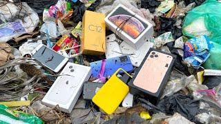 Rich man's trash, Find lots of used phones in junkyard and repair them