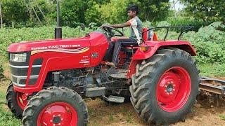 New Mahindra yovo tech Plus 585 4wd tractor goes on 9piont spring cultivater performance in farmland