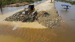 Fantastic New Project Road Highway Constructed by Bulldozer Operator Push Stone Crossing the Flood