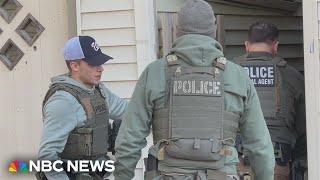 Federal agents seen taking part in a suspected ICE raid in Boston