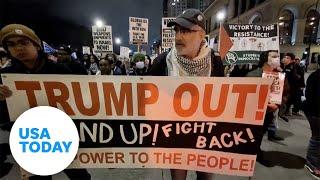 Protesters march in front of Chicago's Trump tower | USA TODAY