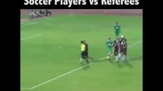 Football players fighting with referees