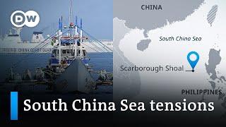 Philippines send fishing vessels to China-claimed Scarborough Shoal | DW News