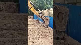 The process of compacting soil using an excavator jackhammer
