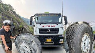 Rescue of concrete pump truck and 100-ton cargo tractor with flat tire on the road