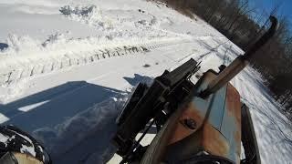 Ford 5000 tractor removing snow with front end loader.